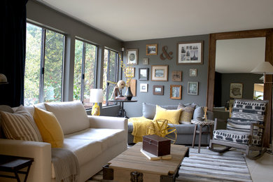 Immagine di un soggiorno chic di medie dimensioni e chiuso con pareti grigie e pavimento in gres porcellanato