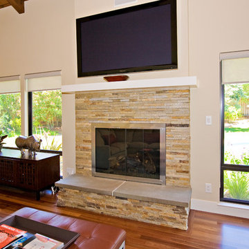 family room, stone masonry fireplace with flat TV