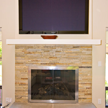 family room, stone masonry fireplace with flat TV
