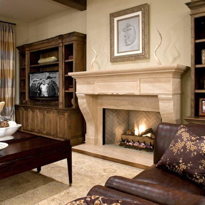 Family room - traditional family room idea in Minneapolis with beige walls, a standard fireplace and a tv stand