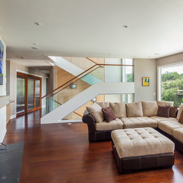 Family room to stairs— 2014 Lakeway Warm Contemporary Waterfront Custom Home on