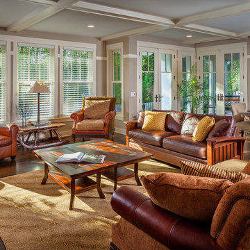 Family Room with Floor to Ceiling Windows and Double French Doors