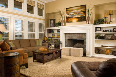 Ejemplo de sala de estar clásica renovada sin televisor con paredes beige, suelo de madera oscura y todas las chimeneas
