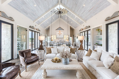 Example of a farmhouse family room design in Austin