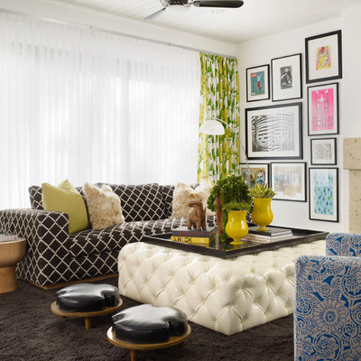 Example of a trendy family room design in Orange County with white walls