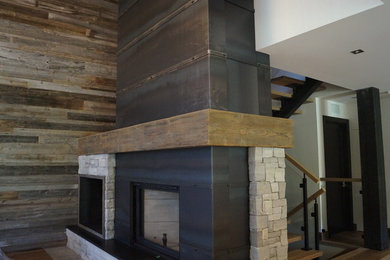 Example of a mountain style family room design in Montreal