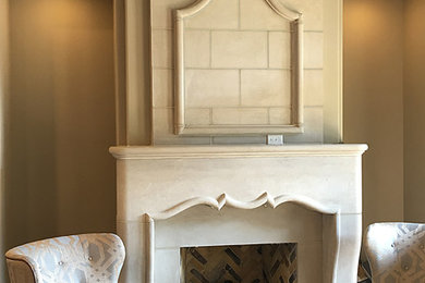 Inspiration for a family room remodel in Houston with a stone fireplace