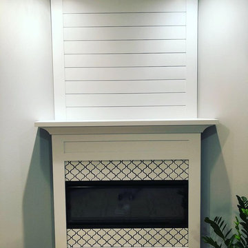 Fireplaces. Custom mantles and tile installation.