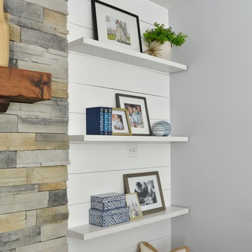 Floating shelves on shiplap walls; shelf styling