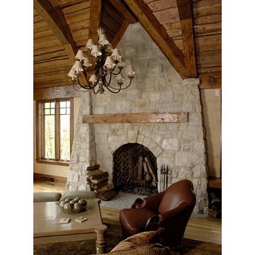 Floor to Ceiling Stone Fireplace with Distressed Wood Timber Mantle