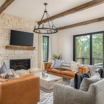 Example of a beach style family room design in Charleston
