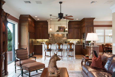 Tuscan family room photo in Tampa