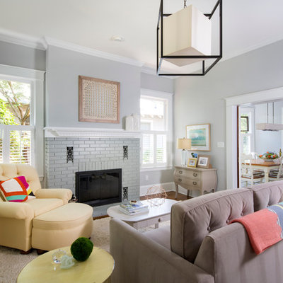Inspiration for a mid-sized transitional open concept dark wood floor family room remodel in Charlotte with gray walls, a standard fireplace and a brick fireplace