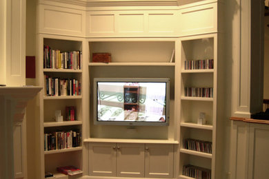 Design ideas for a traditional games room in Boston with beige walls and a built-in media unit.