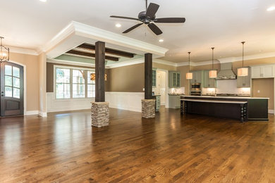 Example of a transitional family room design in Raleigh