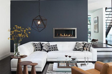 Example of a large eclectic open concept dark wood floor and brown floor family room design in Los Angeles with white walls, a ribbon fireplace and a metal fireplace