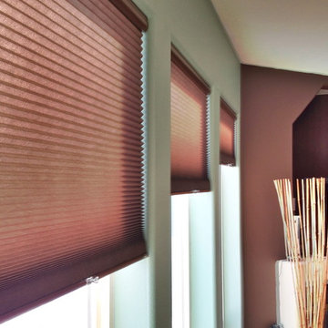 Graber Celluar Shades to coordinate with the color of the Roman Shades in the Li
