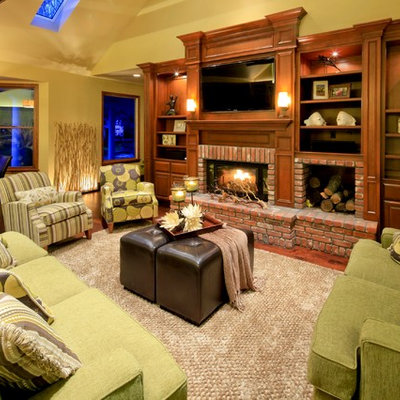 Inspiration for a timeless family room remodel in Sacramento with beige walls, a standard fireplace, a brick fireplace and a wall-mounted tv