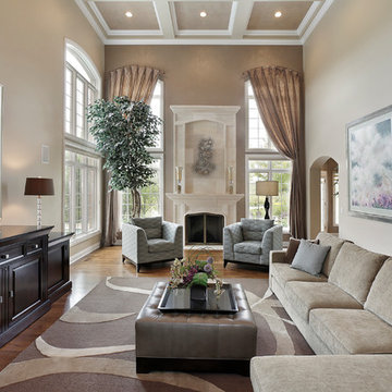Great Room with Faux-Finished, Coffered, Volume Ceiling and Fireplace