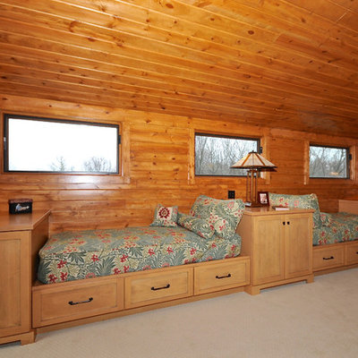 Inspiration for a large craftsman loft-style carpeted family room remodel in Indianapolis with brown walls and a media wall