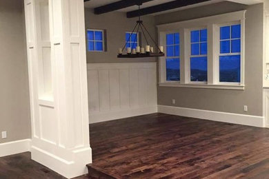 Inspiration for a large contemporary open concept dark wood floor and brown floor game room remodel in Houston with gray walls, no fireplace and no tv