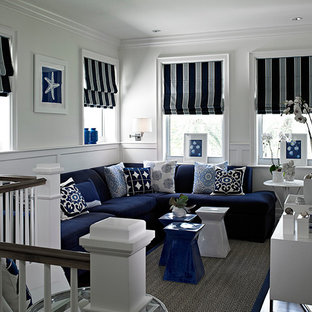 Example of a mid-sized transitional loft-style dark wood floor and gray floor family room design in Miami with white walls, no fireplace and a wall-mounted tv
