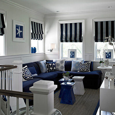 Example of a mid-sized transitional loft-style dark wood floor and gray floor family room design in Miami with white walls, no fireplace and a wall-mounted tv