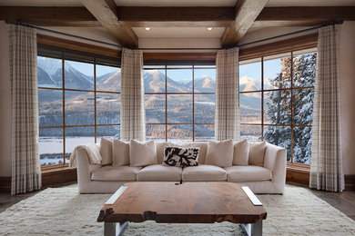Example of a large mountain style family room design in Denver