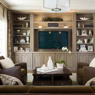 Example of a classic family room design in San Francisco with no fireplace and a media wall