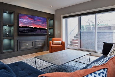 Inspiration for a games room in Phoenix with a wall mounted tv.
