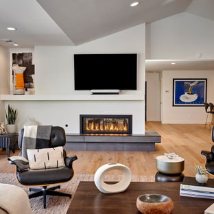 Large minimalist open concept family room photo in San Diego with a wall-mounted tv