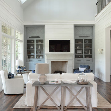 Hopes Neck Farmhouse Living Space with Built-Ins and Fireplace
