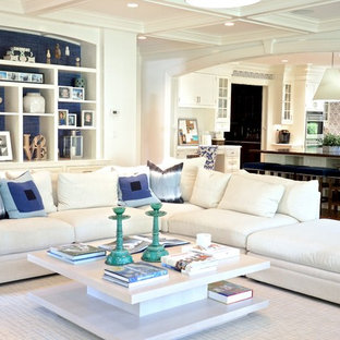 Inspiration for a mid-sized contemporary open concept dark wood floor and brown floor family room remodel in New York with gray walls, no fireplace and no tv