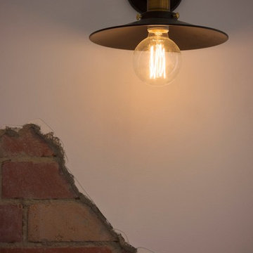 Industrial light showing off the exposed brick
