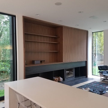 Interior built-ins: sliding walnut panel