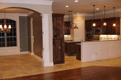 Mid-sized elegant dark wood floor family room photo in Salt Lake City with beige walls