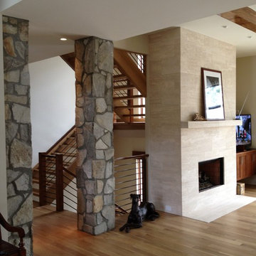 Interior Stone Columns & Travertine Fireplace