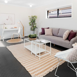 Photo of a mid-sized contemporary family room in Sydney with grey walls, carpet and grey floor.
