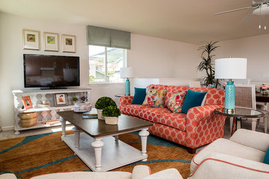 Beach style enclosed family room photo in San Francisco with a tv stand