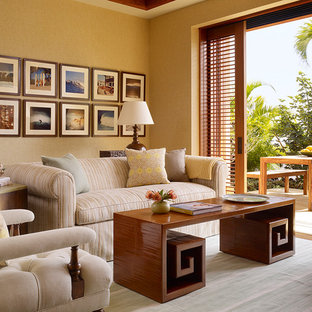 Family room - tropical family room idea in Hawaii with beige walls