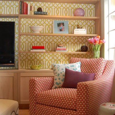 Example of a transitional medium tone wood floor family room design in San Francisco with multicolored walls