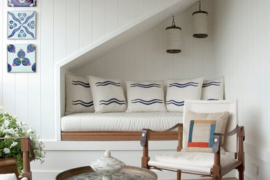Inspiration for a mid-sized coastal open concept family room remodel in New York with white walls, no fireplace and no tv