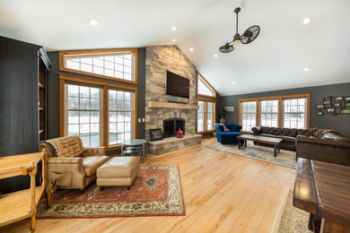 Example of an arts and crafts family room design in Grand Rapids