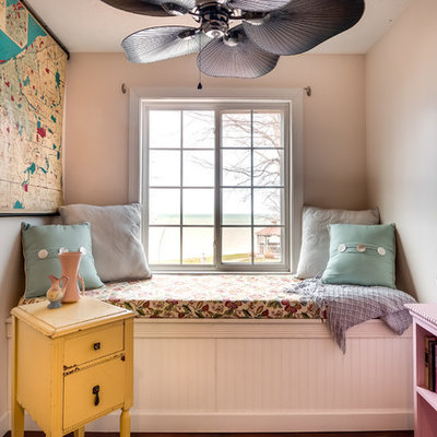 Inspiration for a farmhouse family room library remodel in Cleveland with pink walls