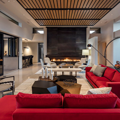 Example of a large trendy open concept concrete floor and white floor family room design in Phoenix with a bar, white walls, a ribbon fireplace and a metal fireplace