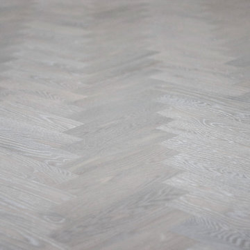 Lime washed natural gray oiled herringbone floors