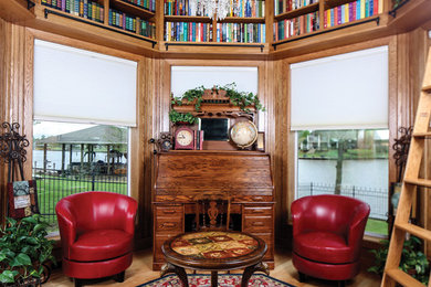 Example of a classic family room design in New Orleans