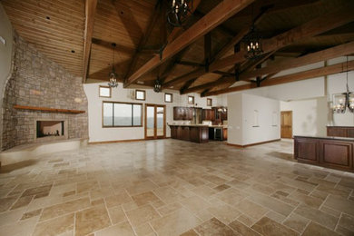 Family room - large traditional open concept ceramic tile and beige floor family room idea in San Diego with white walls, a standard fireplace and a stone fireplace