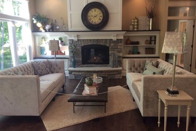 Example of a transitional family room design in Grand Rapids