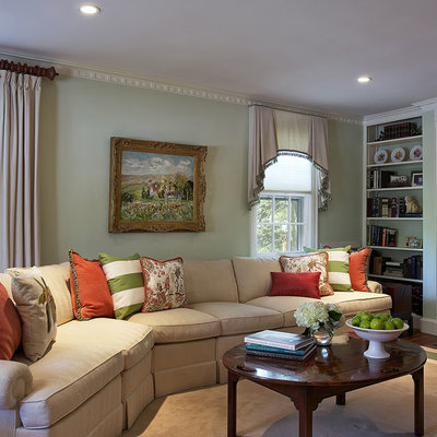 Family room - traditional family room idea in New York with green walls